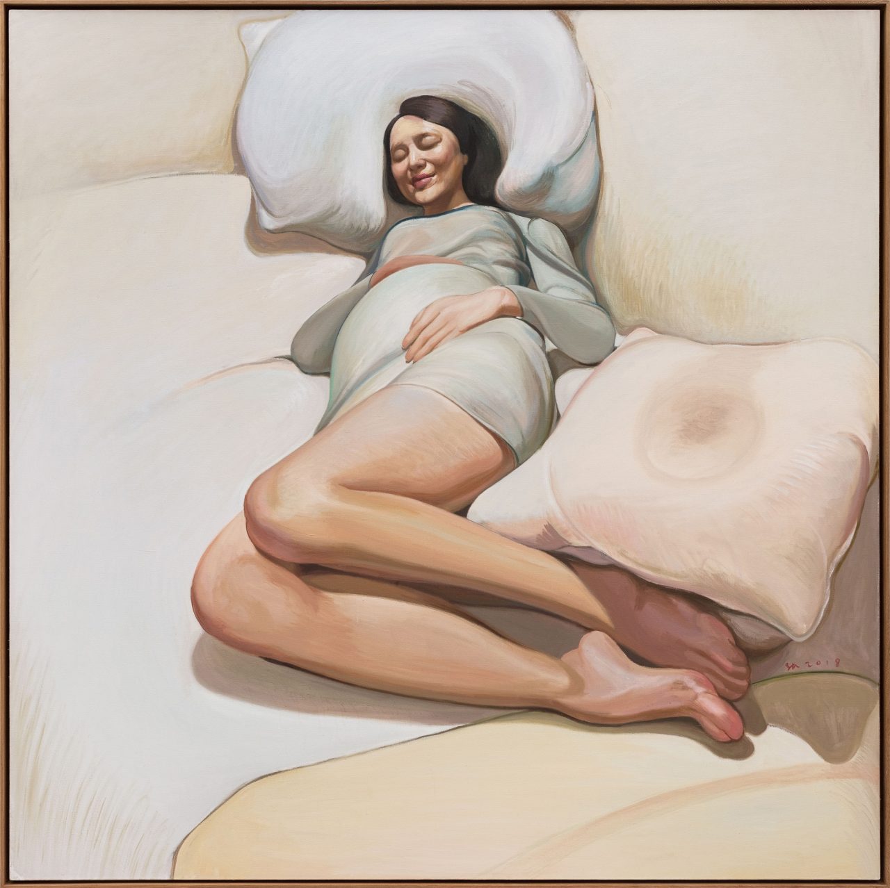 Pregnant Woman on the Bed
